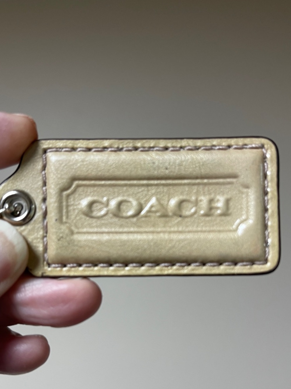 COACH Cream Pearlized Leather Embossed Hang Tag with Ball Chain